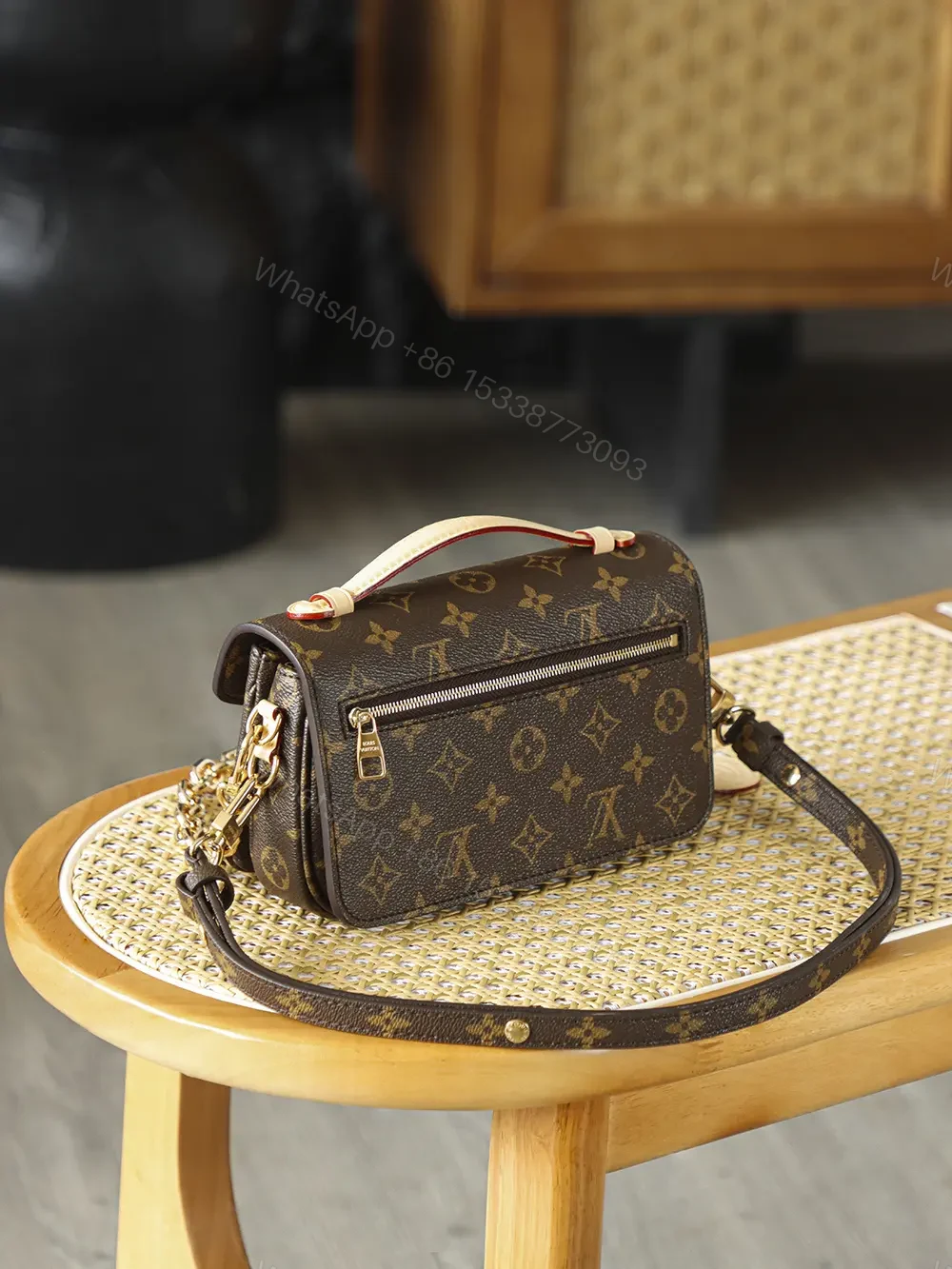 View 3 of Louis Vuitton Pochette Métis East West bag