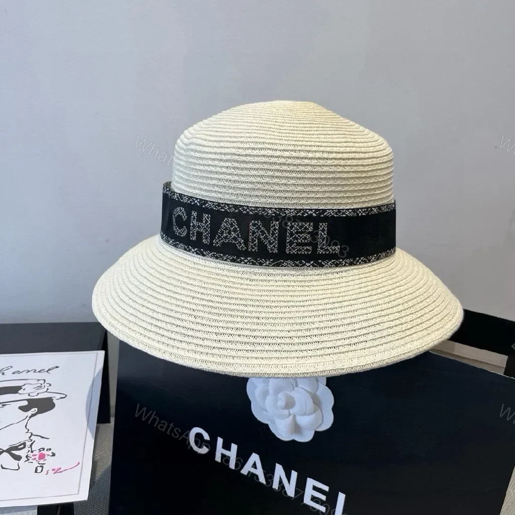 View 9 of Natural Straw Bucket Hat with Signature Band, Chic ResortStyle