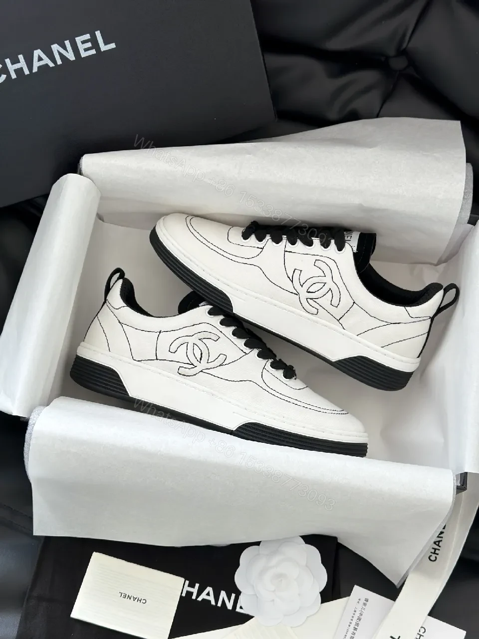 View 9 of Premium White Leather-like Low-Top Sneakers: Sleek, Comfortable, Versatile
