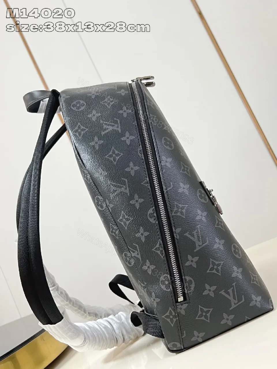 View 4 of Compact Monogram Canvas Backpack: Subtle Luxury, Everyday Utility