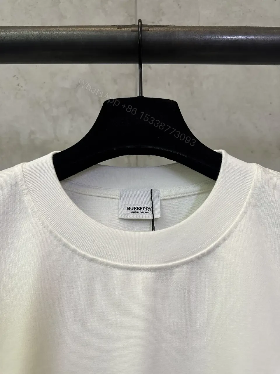 View 5 of Bold Logo Tee: Minimalist Comfort, Black Graphic White Tee