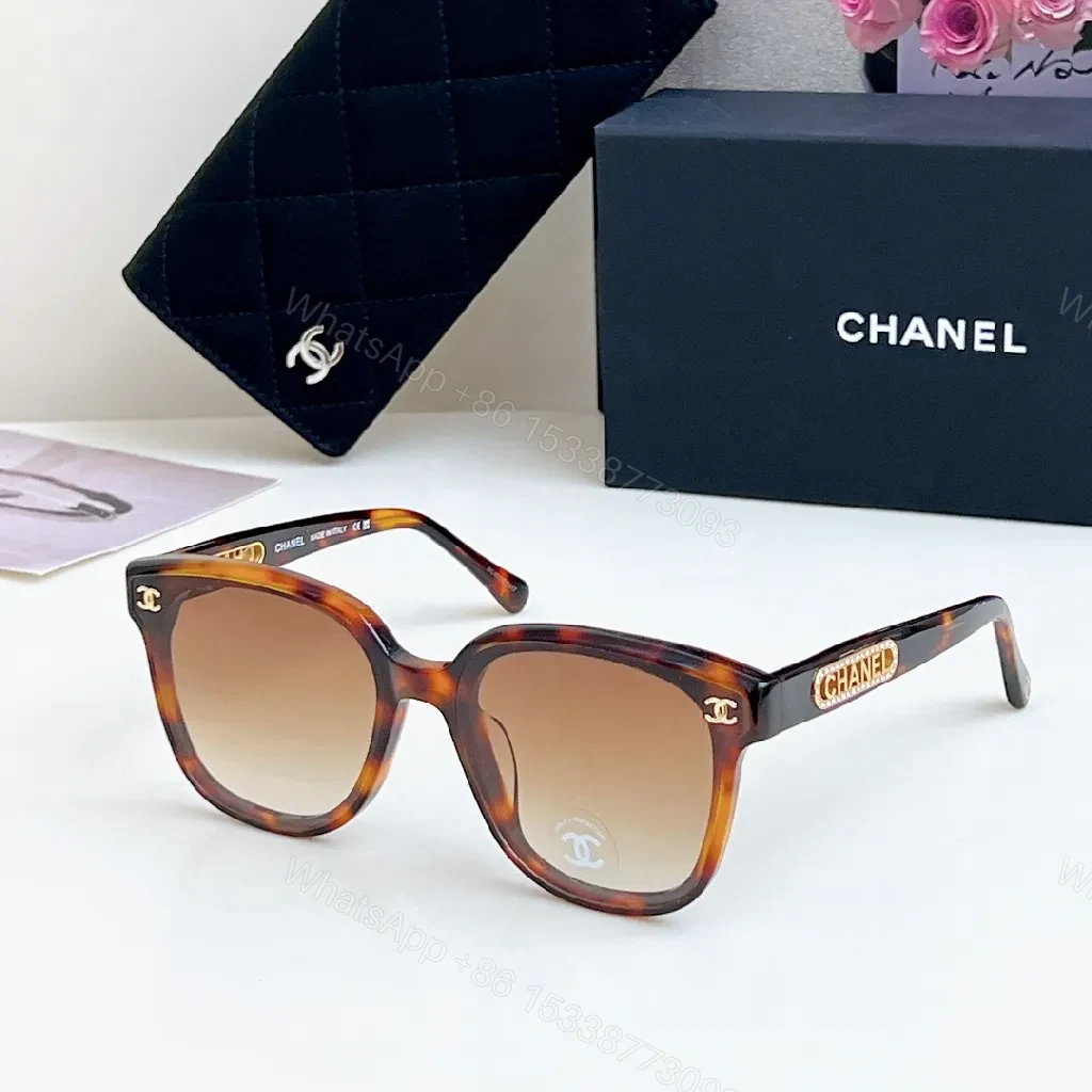 View 2 of Bold Black Sunglasses with Gold-Accent Luxury Detail (Sunglasses)
