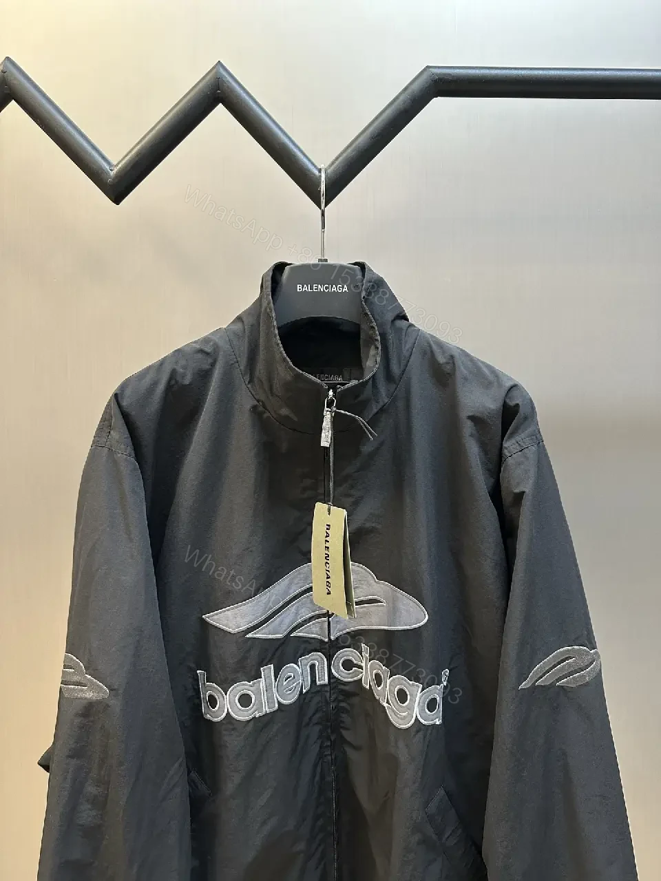 View 9 of Black Nylon Windbreaker Modern Logo-Driven Streetwear Jacket