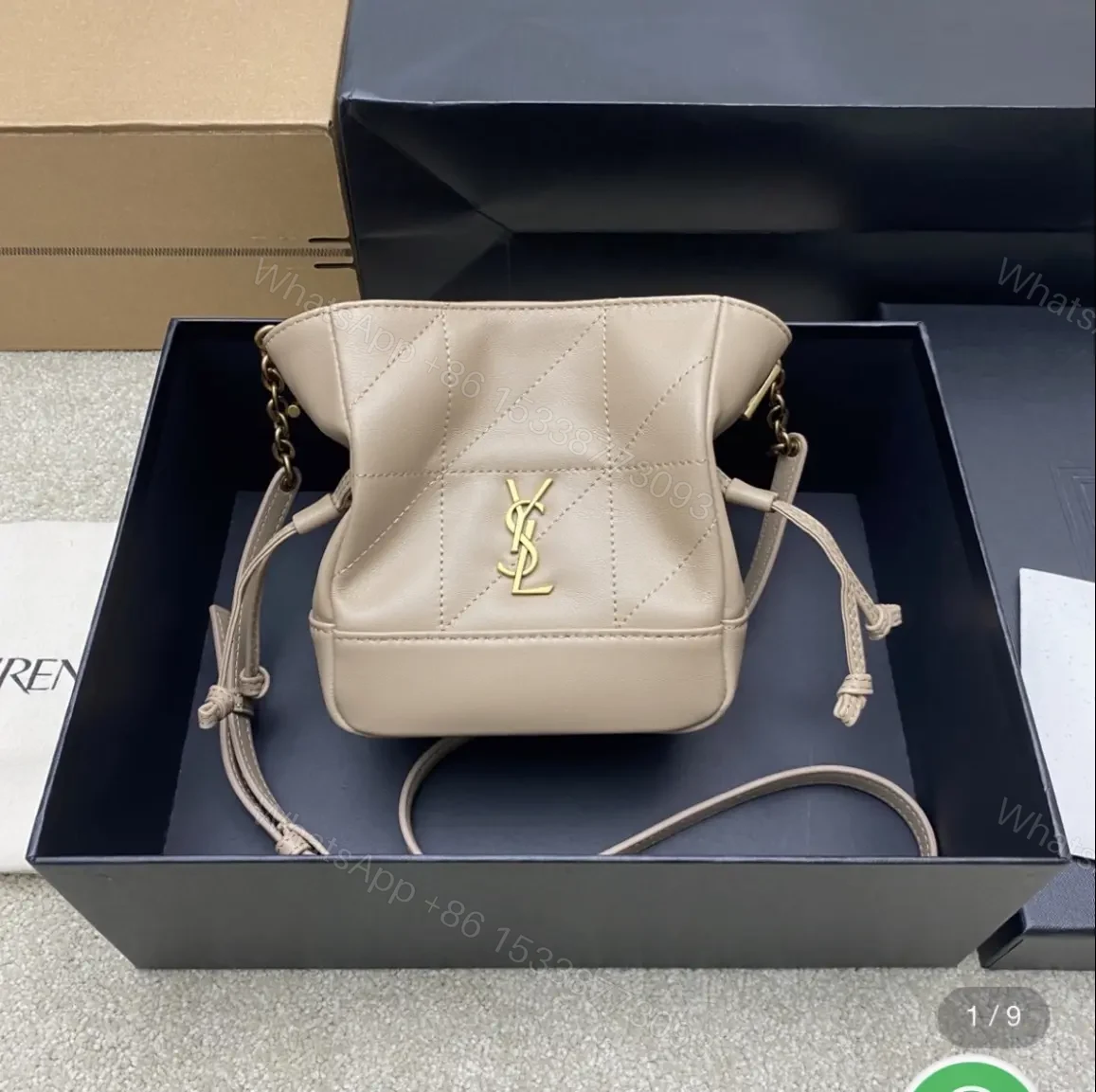 Saint Laurent Jamie mini shoulder pouch in beige lambskin leather. — view 1