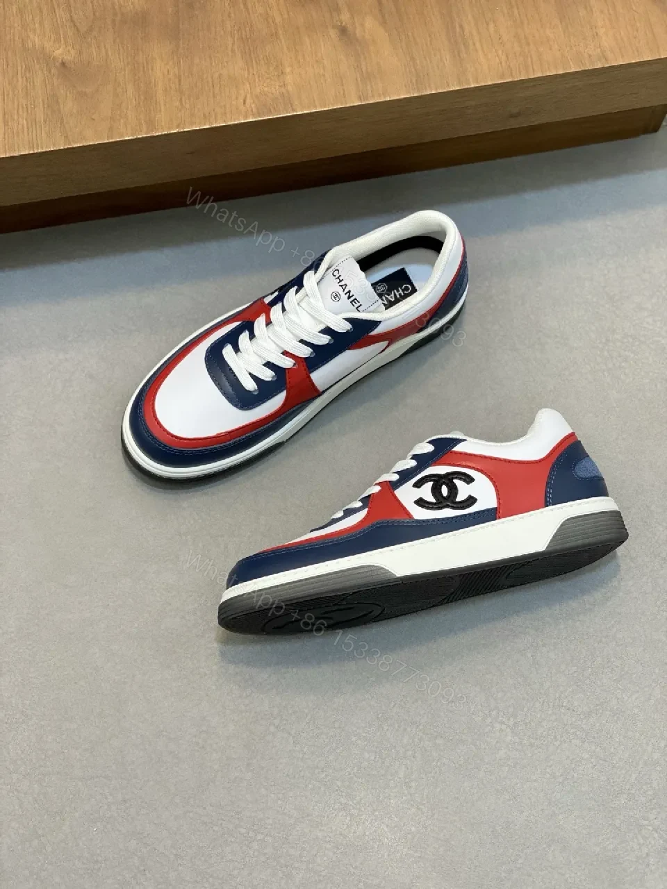 Bold Color-Blocked Leather Sneakers with Logo Detail — view 1