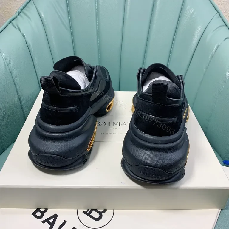 View 2 of Bold Black Balmain Runner: Allâ€‘Day Comfort + Gold Accents