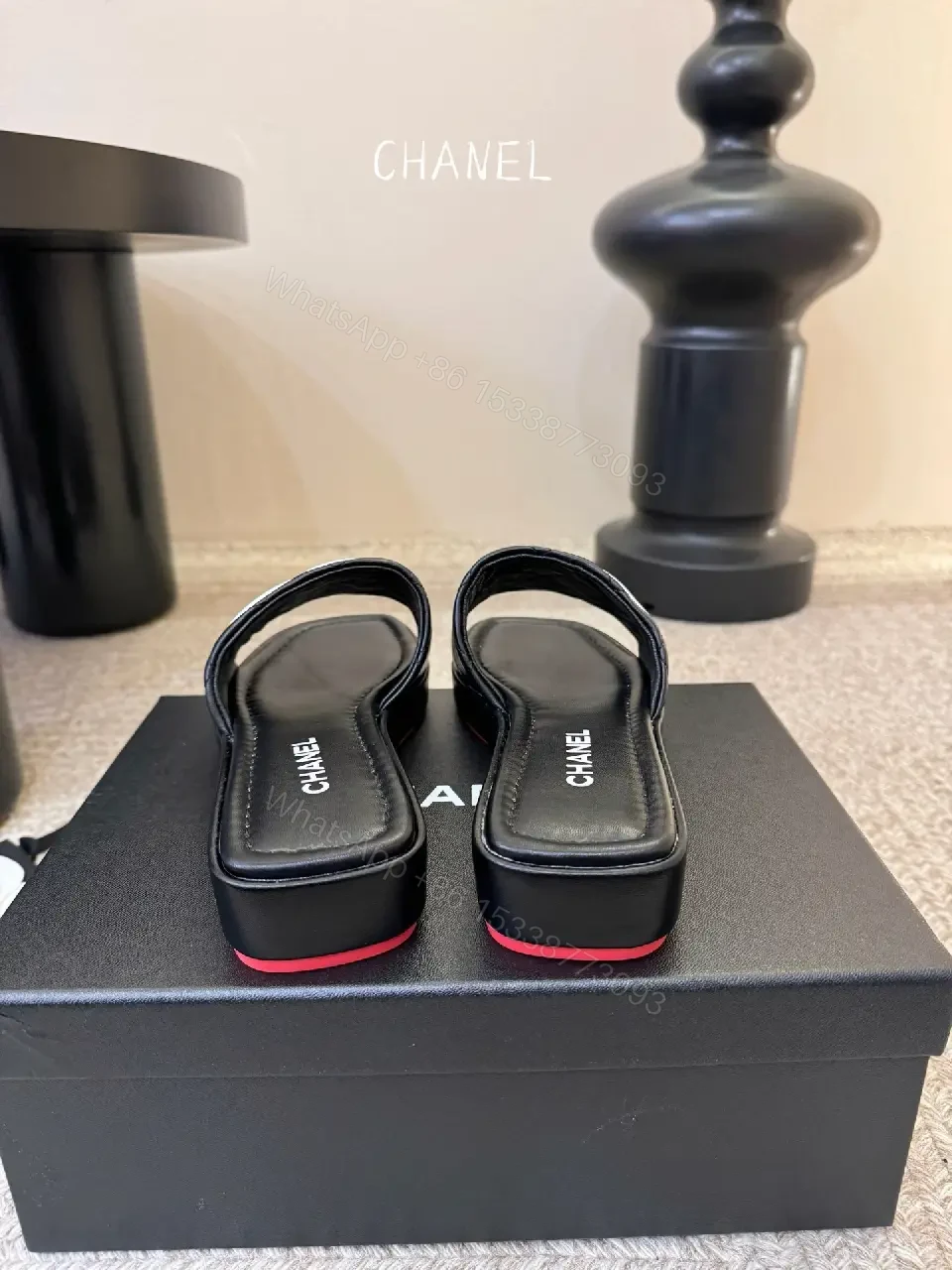 View 7 of Interlocking Logo Slip-Ons: Black & White Luxury Sandals