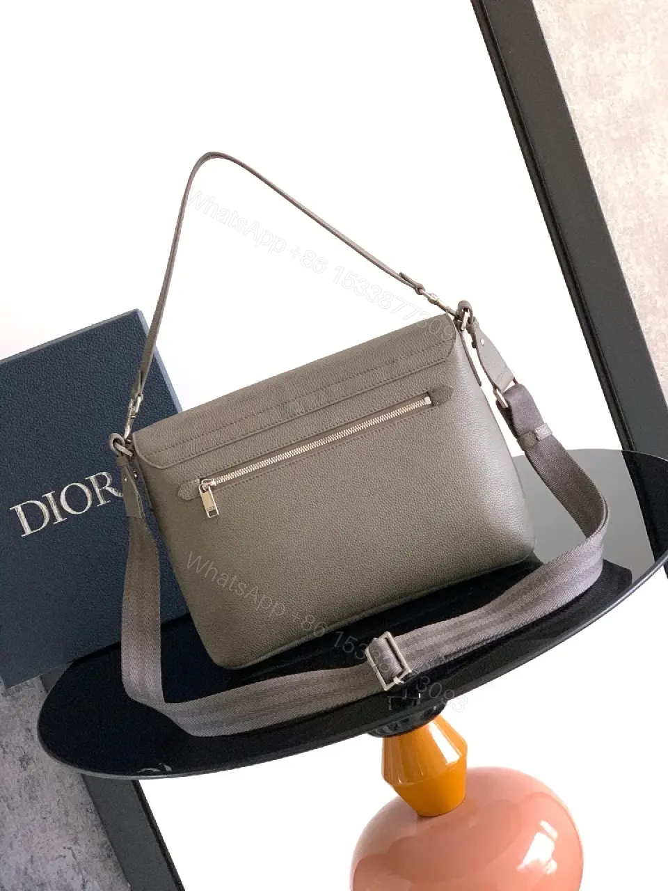 View 4 of Pebble Leather Crossbody: Subtle Branding, Quiet Luxury