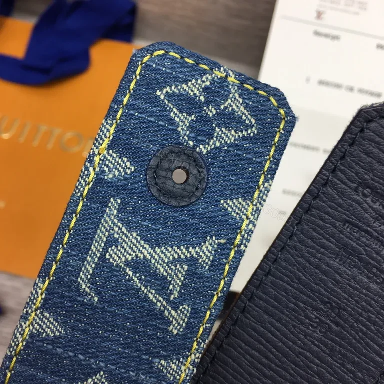 View 2 of Denim Monogram Belt with Gold LV Buckle - Luxury Accessory
