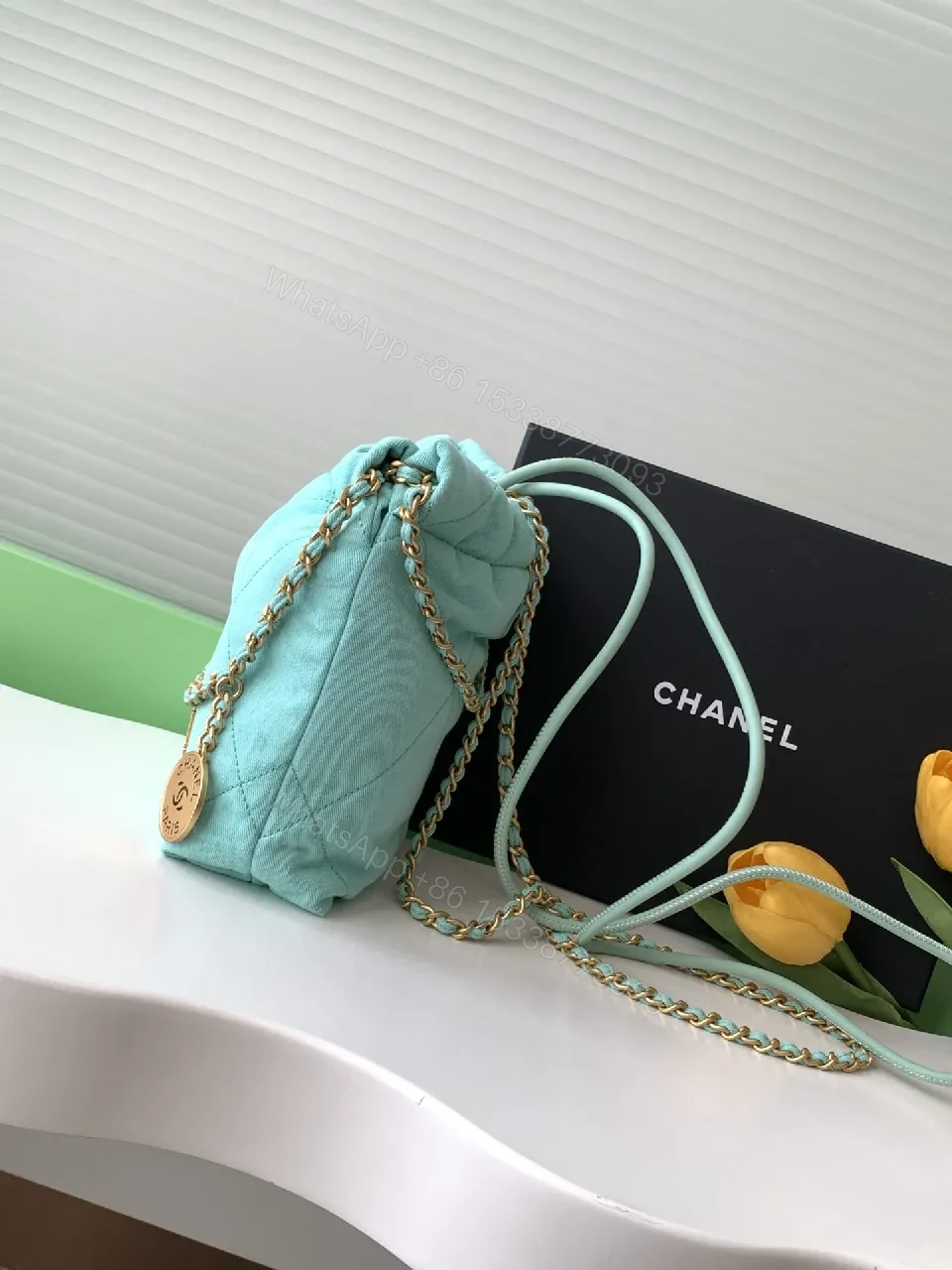 View 7 of Mint Quilted Bag with Gold Chain - Compact Luxury Carry