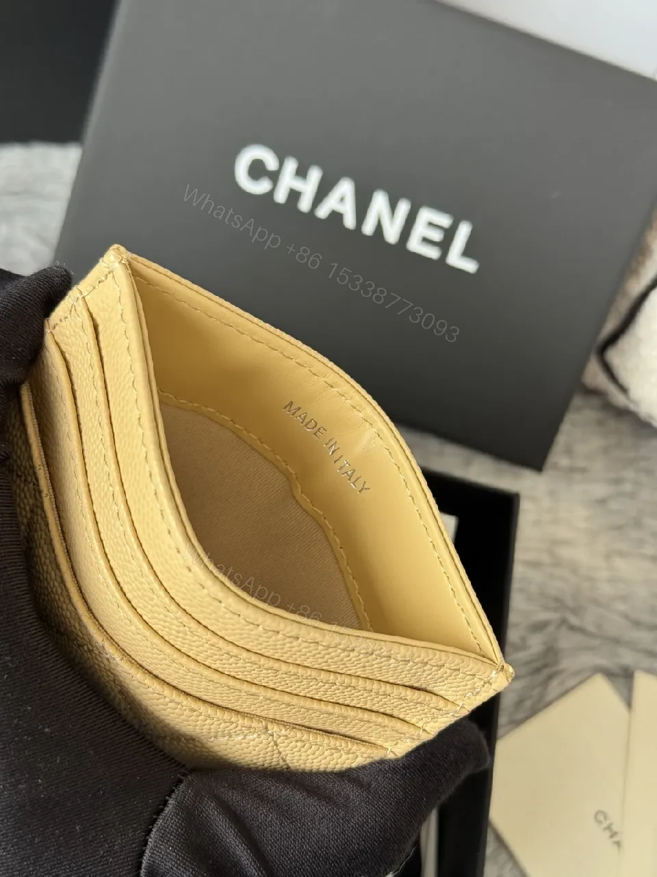 View 8 of Warm Yellow Quilted Wallet with Gold Accent – Compact Luxury
