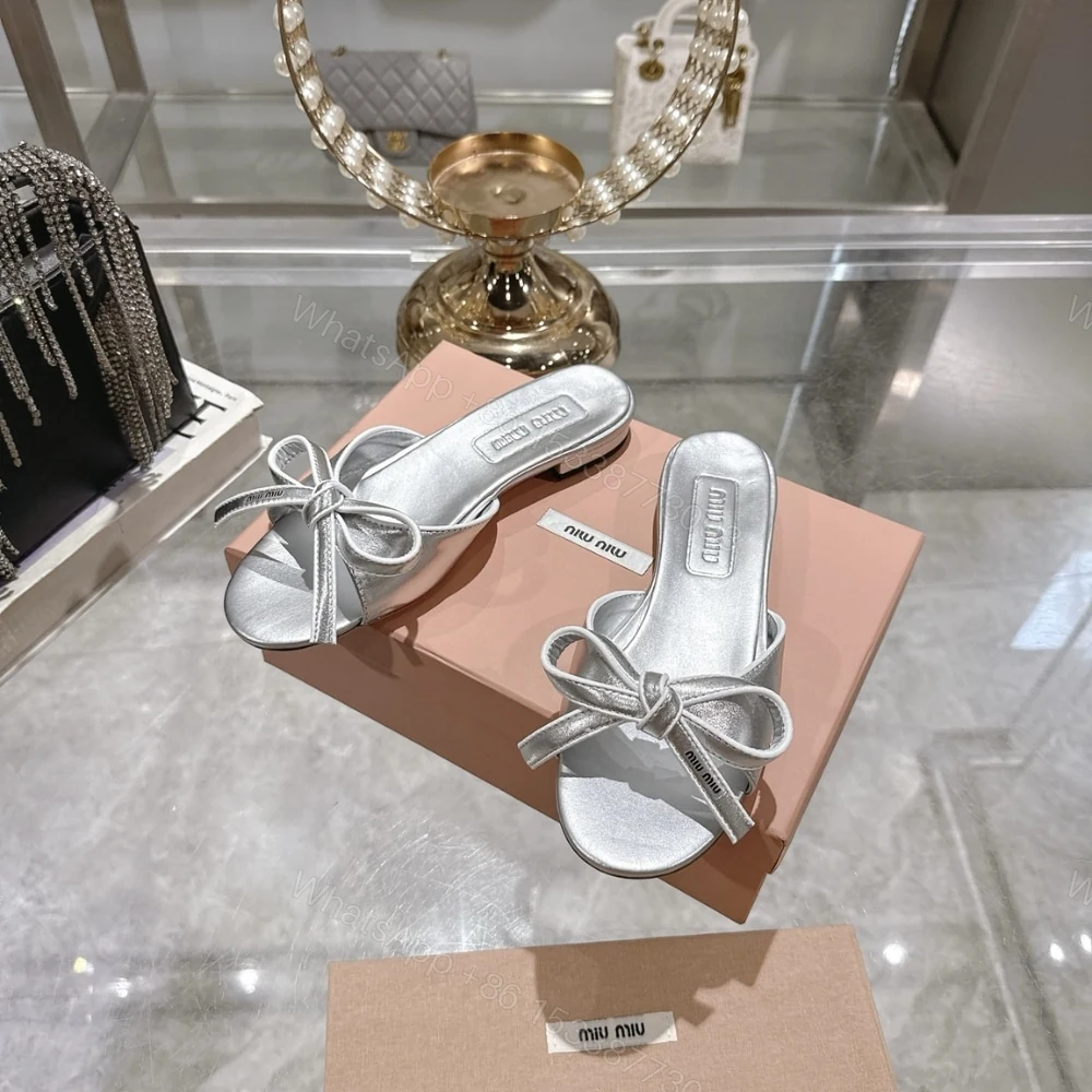 View 2 of MIUMIU MORDORÉ NAPPA SANDALS WITH BOW SILVER