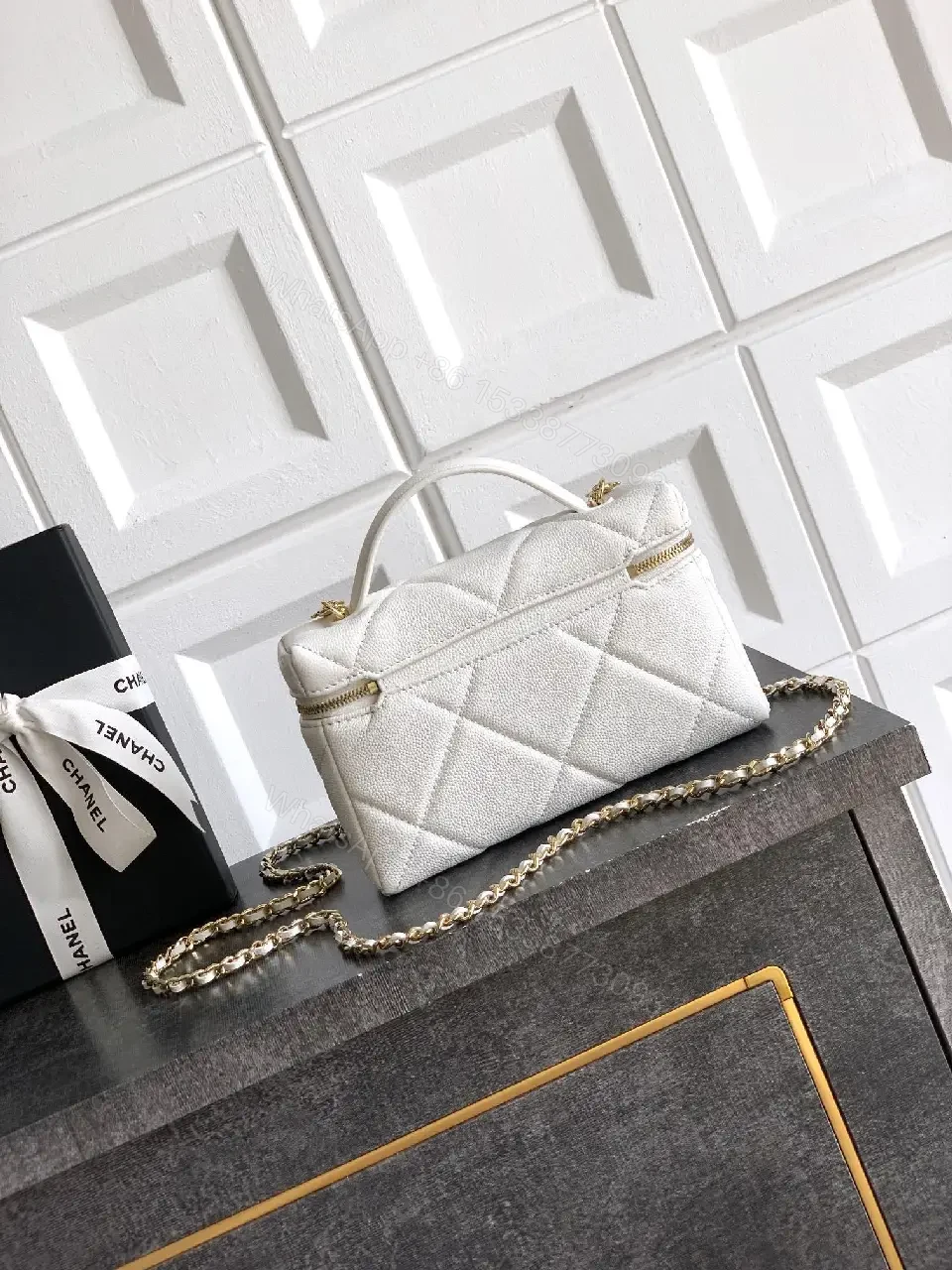 View 3 of White Quilted Mini Bag with Gold Hardware, Sleek Chic Carryall