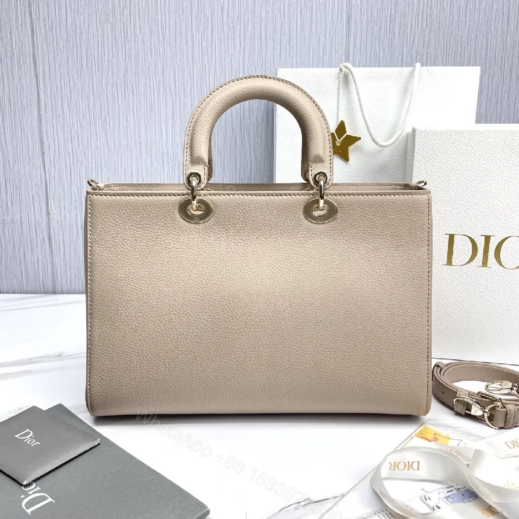 View 8 of Soft-Texture Satchel in Pebbled Leather with Signature Charms
