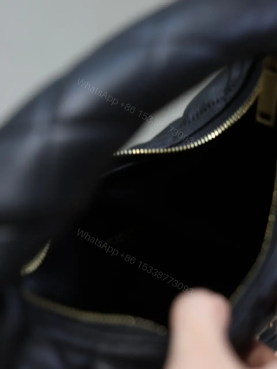View 9 of Quilted Black Faux-Leather Bag with Gold Hardware