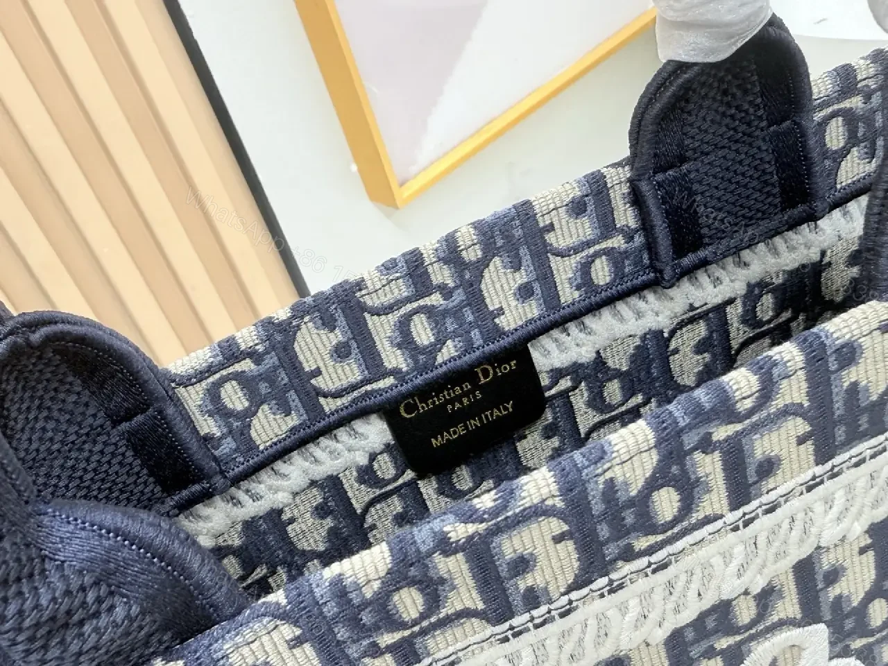 View 6 of Textured tote bag: structured luxury, bold lettering, durable