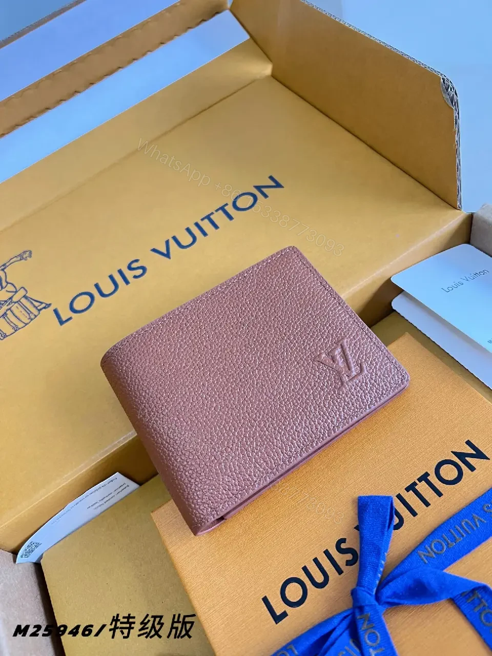 View 4 of Pink-Peach Pebbled Leather Bi-fold Wallet with LV Logo