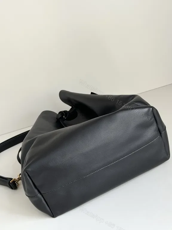 View 9 of Chic Leather Drawstring Bucket Bag with Gold Accent