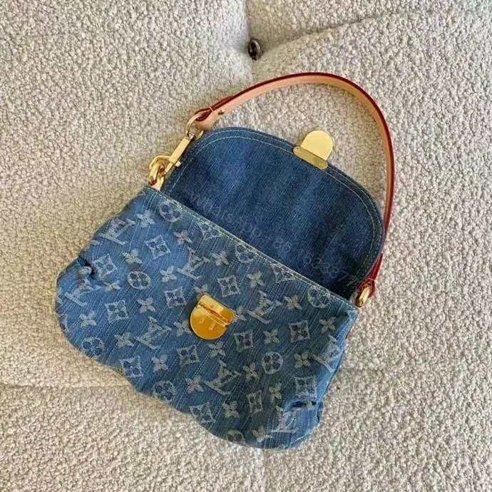 View 4 of Louis Vuitton Pleaty Handbag Monogram Denim Blue 26Cm M95050