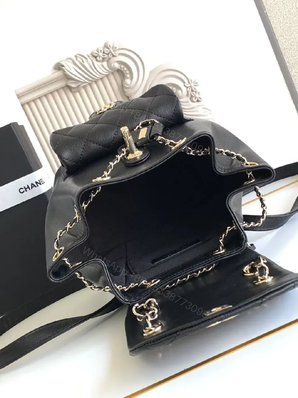 View 8 of Quilted Black Backpack with Gold Hardware Luxury Mini Bag