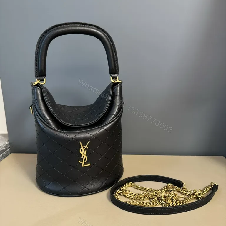 View 2 of Structured Black Quilted Bucket Bag with Gold Accents