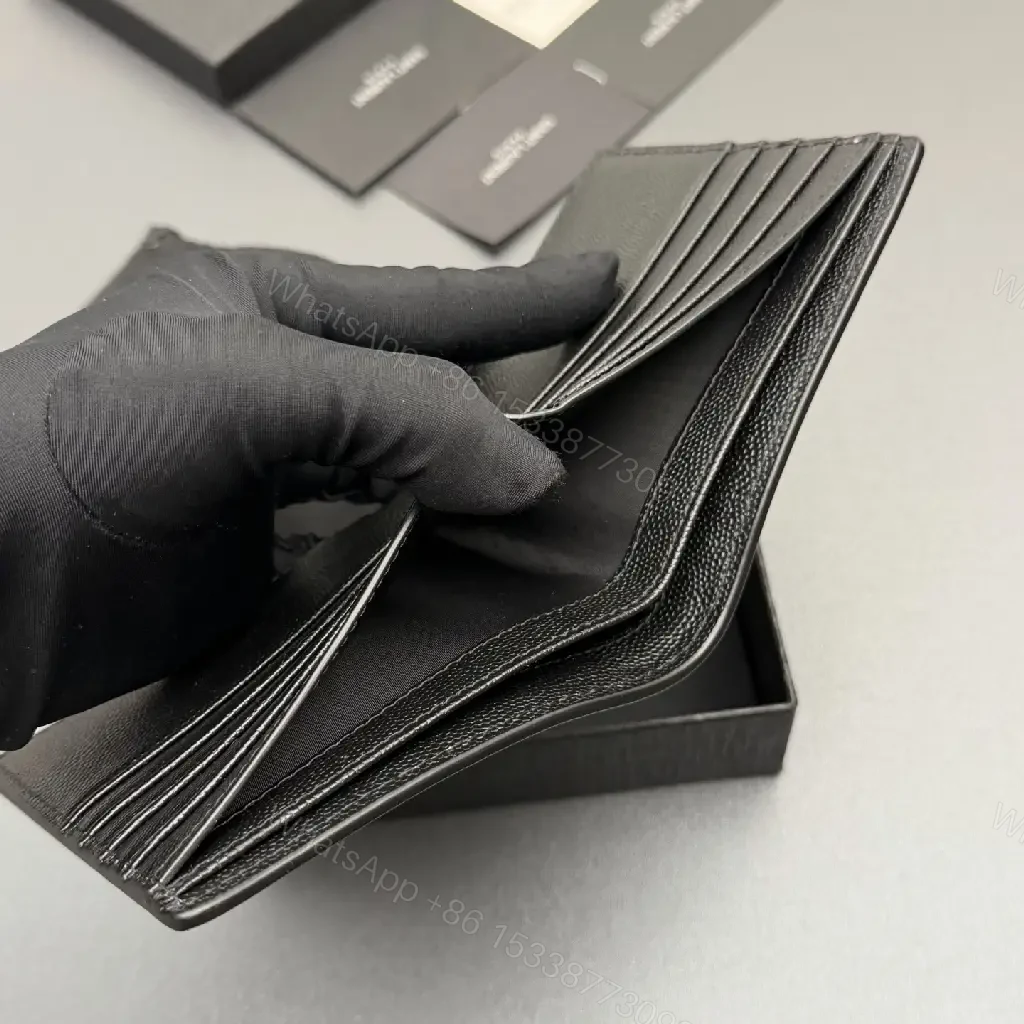 View 10 of Compact Black Pebble Leather Wallet: Minimal Luxury Style