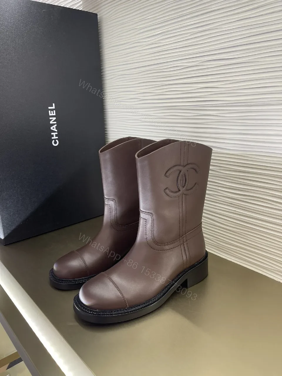 Brown Leather Knee-High Boots with Subtle Couture Embellishment — view 1