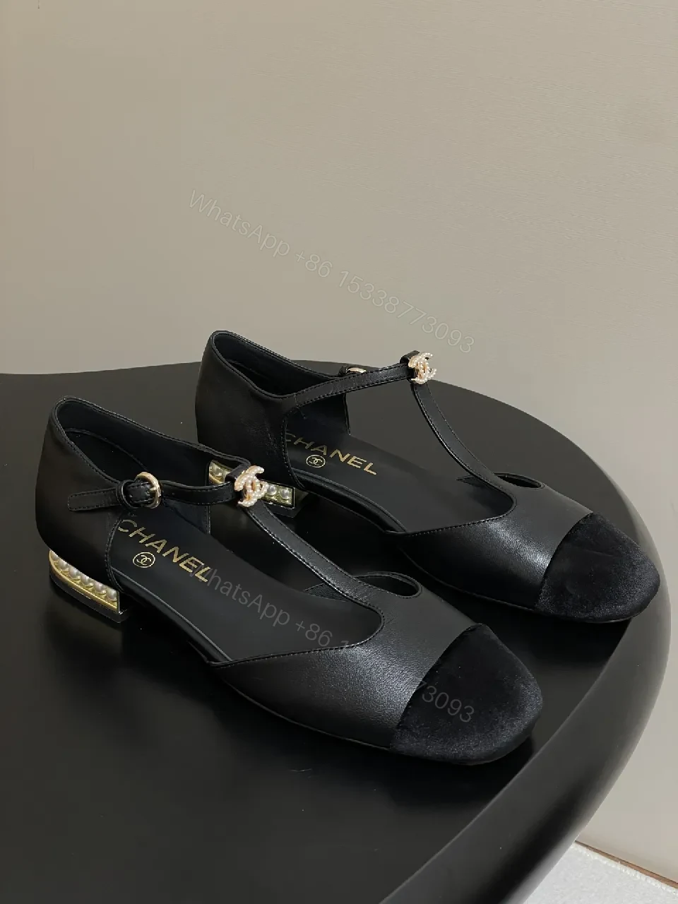 Black Leather Velvet Toe Mary Jane Pumps with Pearl Accent Details — view 1