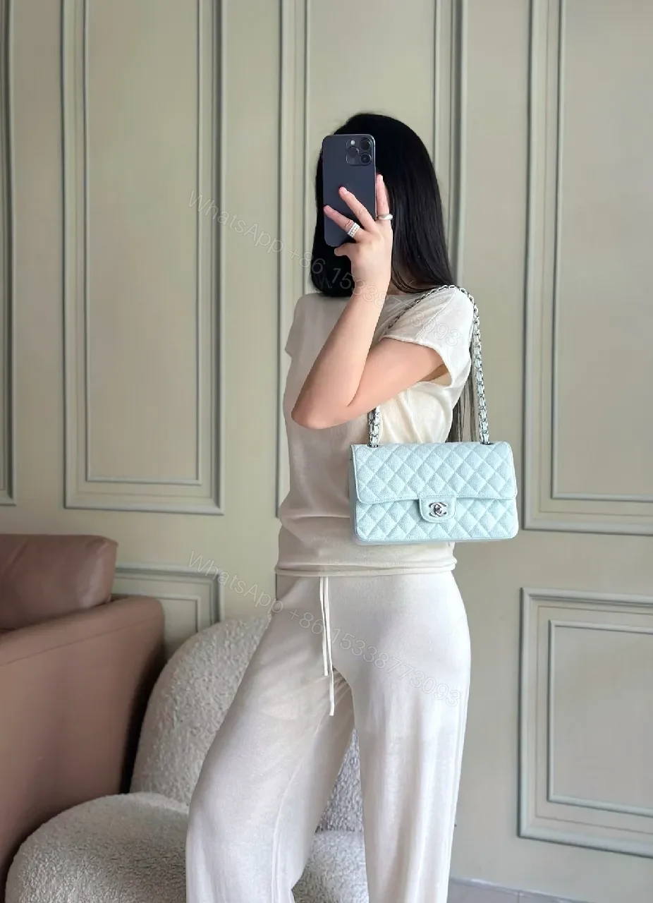 View 2 of Soft Hourglass Quilted Bag in Pale Blue - Everyday Luxury