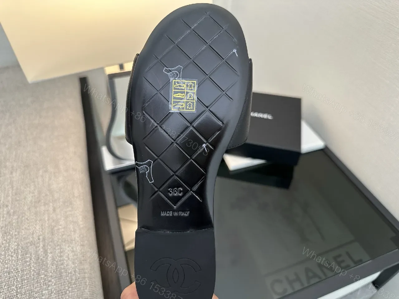 View 3 of Chic Black Quilted Slides with Logo Detailing