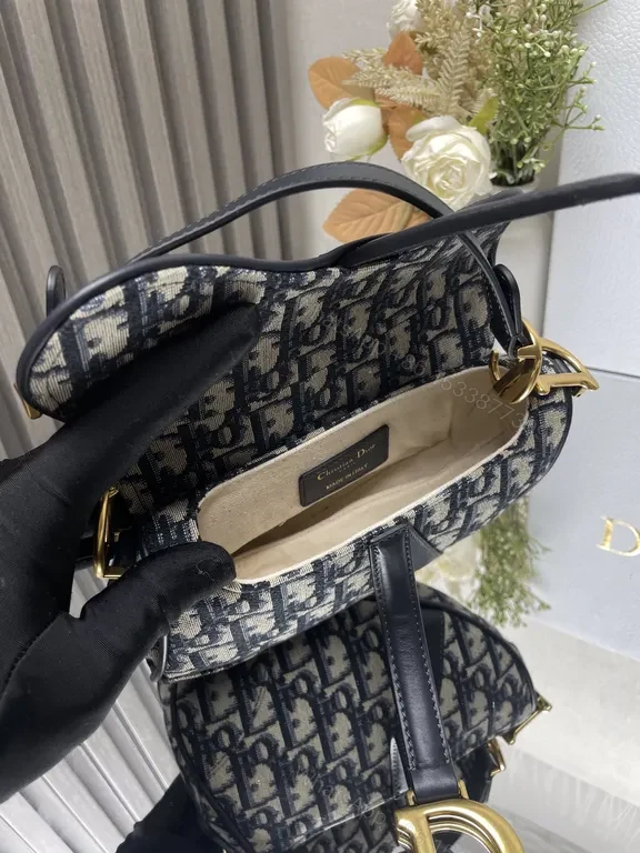 View 2 of Denim-Patterned Bag with Gold Hardware: Structured Luxury