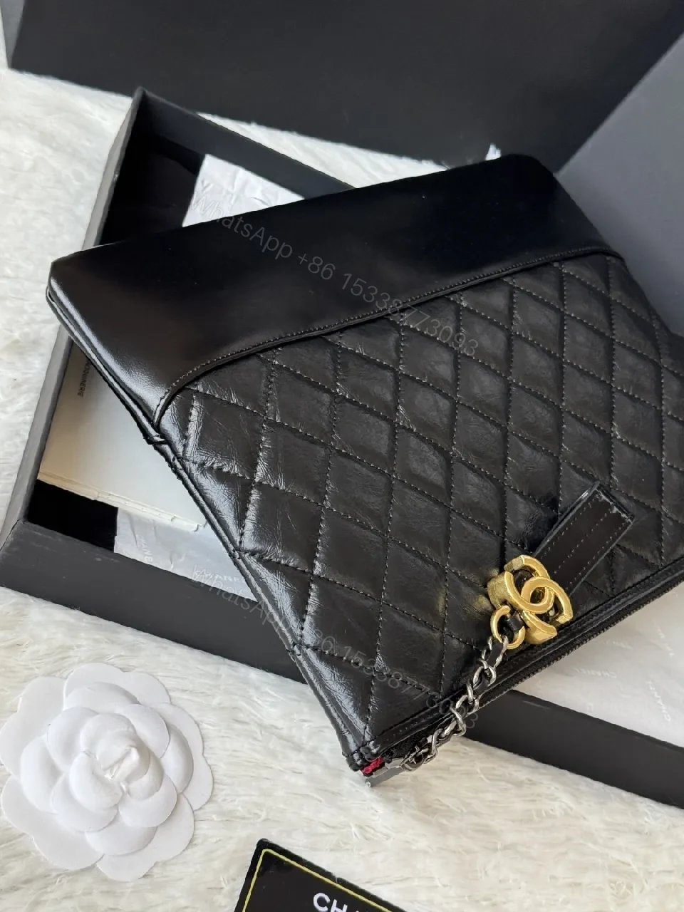 View 6 of Quilted Leather Clutch: Sophisticated, Multi-Use Night Bag