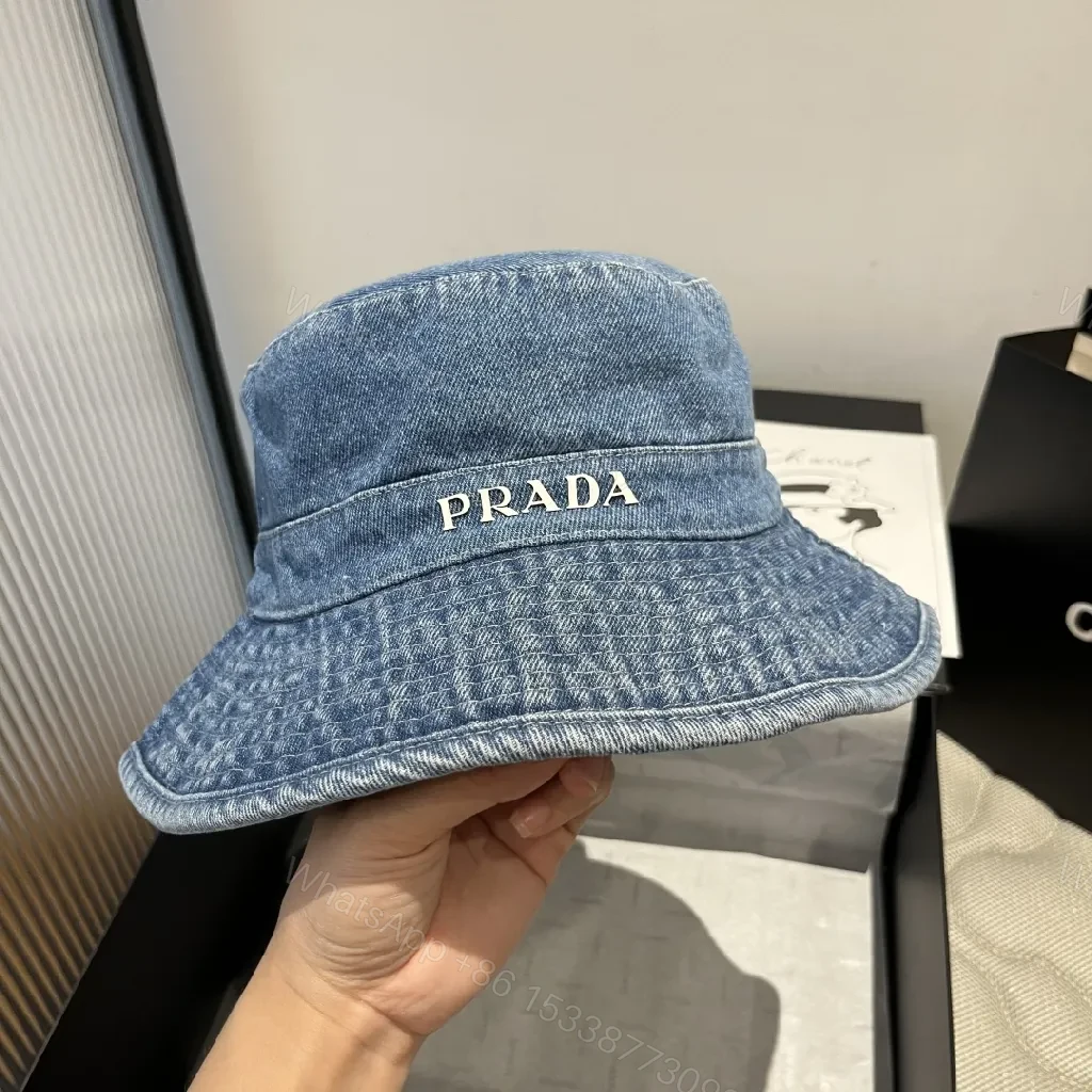 View 10 of Denim Bucket Hat with Lux Logo Detail - Essentials Style
