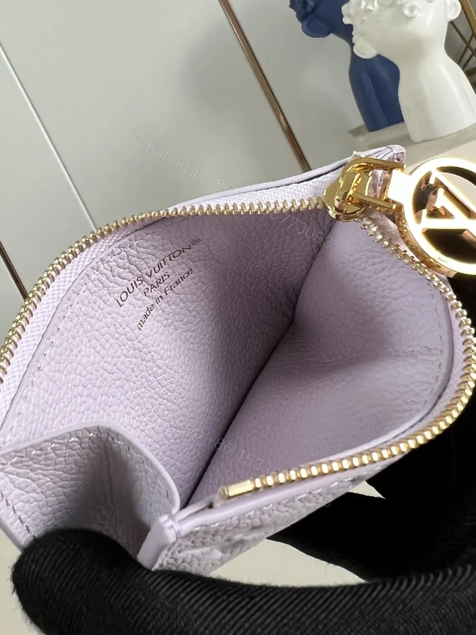 View 4 of Soft Monogram Wallet: Gold LV Charm, Compact Luxury, Leather