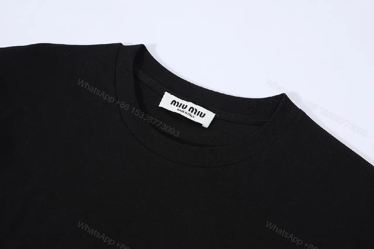 View 5 of Black Cotton Minimalist Tee – Subtle Chest Logo, Premium Essential