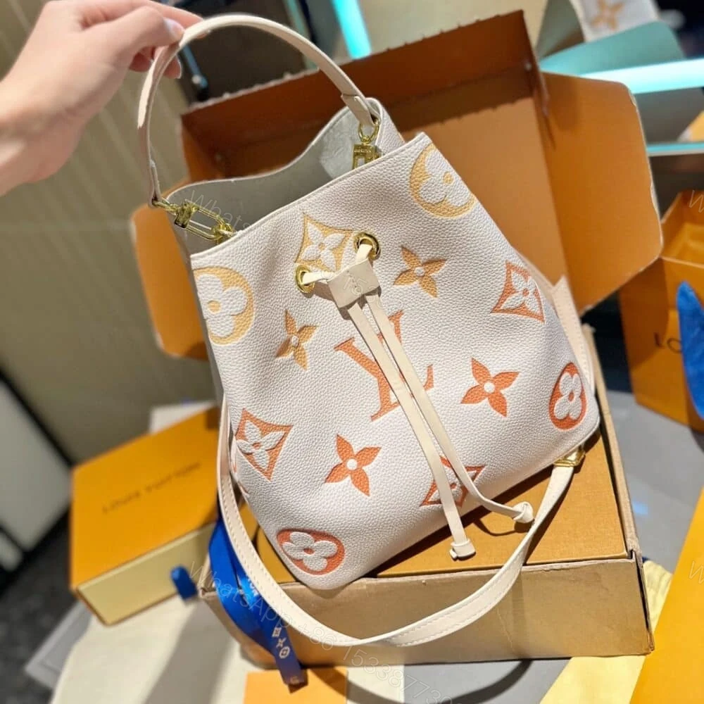 View 2 of Louis Vuitton Neonoe BB Monogram Latte And Orange 25Cm