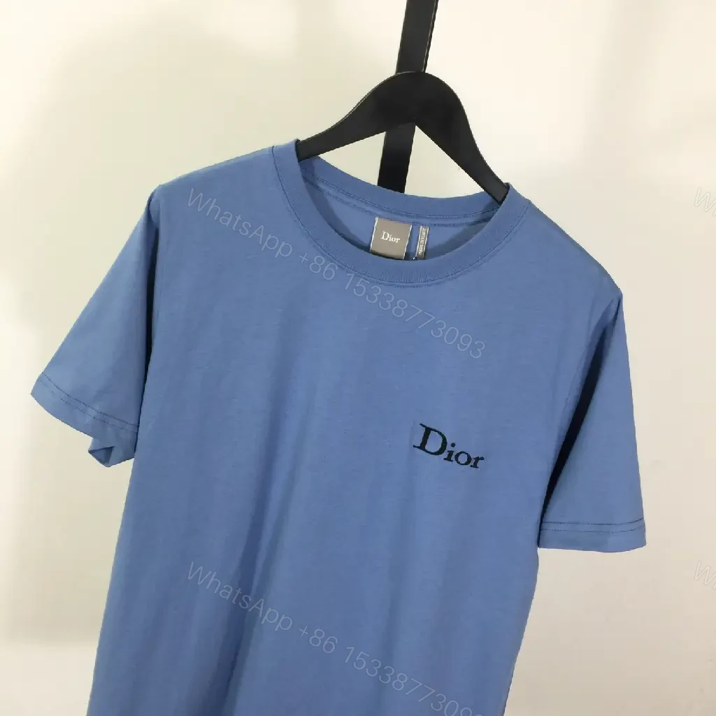 View 5 of Cozy Blue Luxe Tee: Lightweight Cotton-Blend, Subtle Logo, Modern-Casual