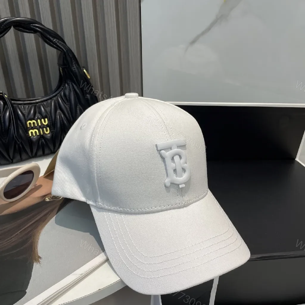 View 5 of Minimalist Textured Cap with Subtle Logo Detail