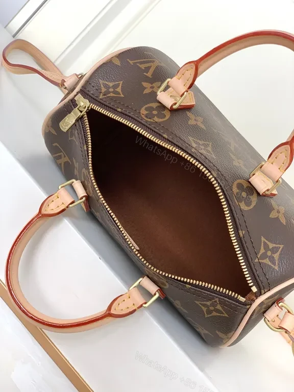 View 5 of Louis Monogram Carry: City-Ready Leather-Trim Handbag