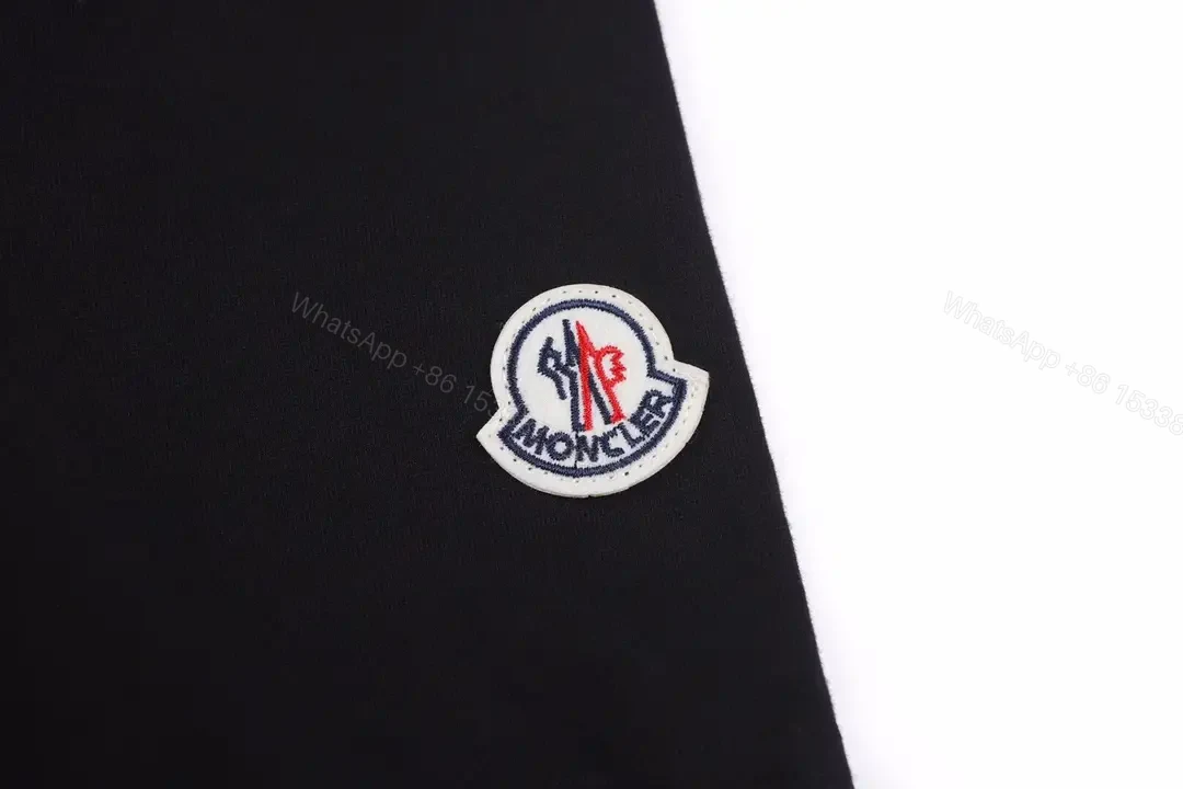 View 3 of Matte Black Cotton Tee with Subtle Embossed Logo, Modern Comfort