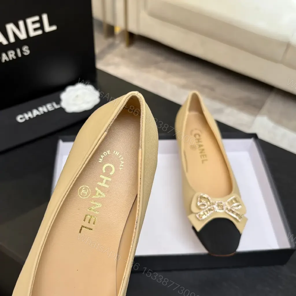 View 9 of Beige Leather Flats with Black-Toe Cap & Crystal Bow