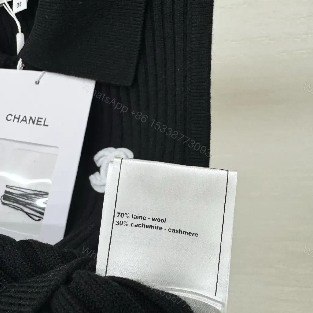 View 6 of Chic Knit Tank: Minimalist Black, Luxe Logo Accent, Zippered Flow