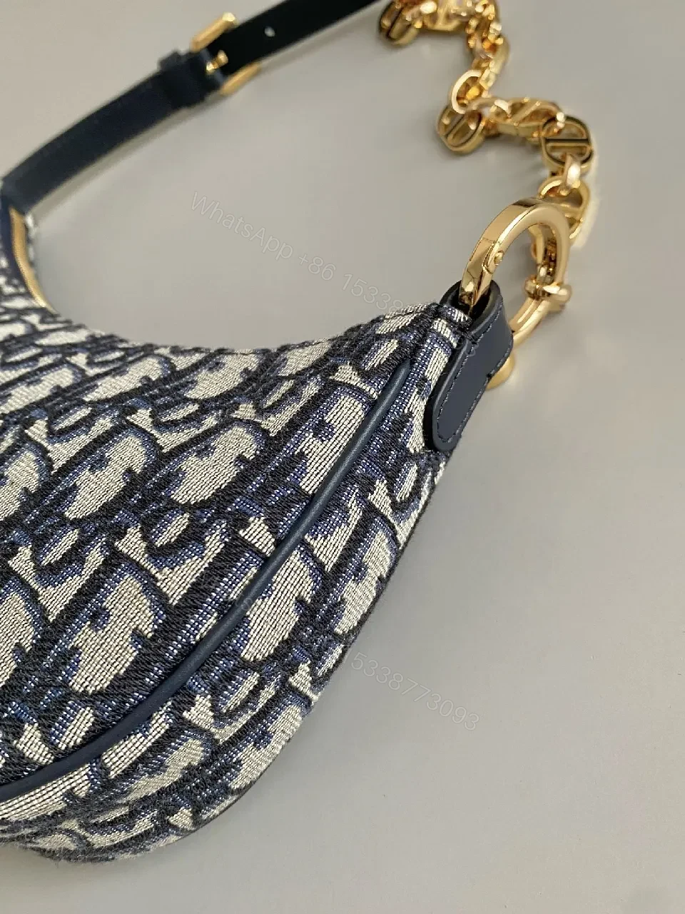 View 8 of Compact Monogram Bag: Gold Chain Accent, Leather Trim, Luxurious Compact Shoulder Bag