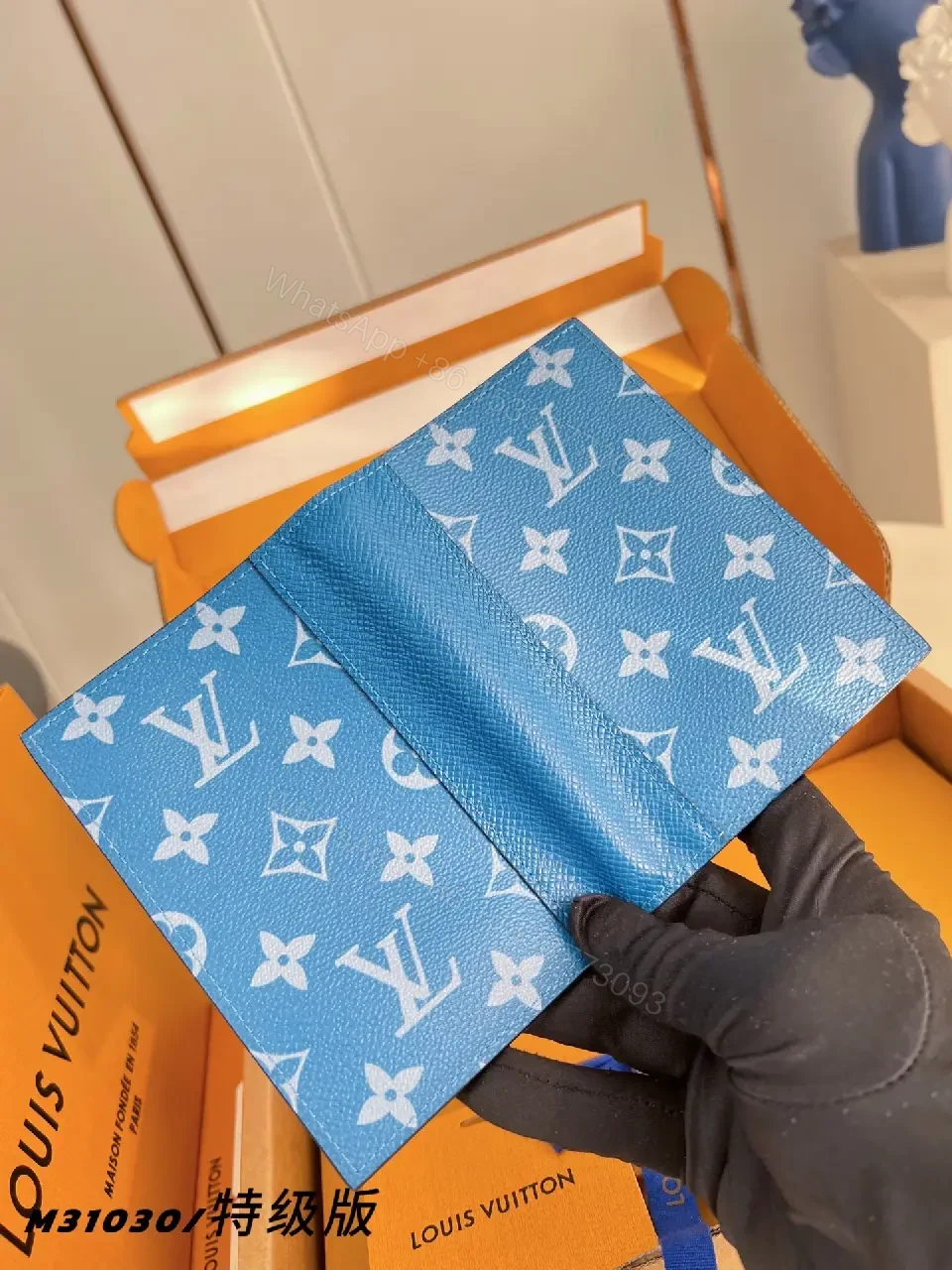 View 5 of Blue Monogram Leather Wallet: Compact Luxury, Secure Card Slots