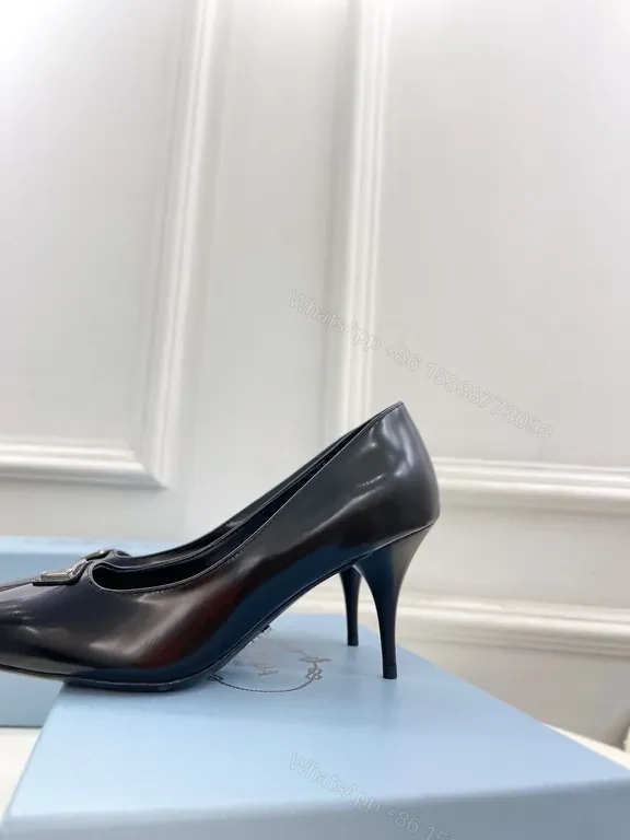 View 4 of Sleek Black Leather Pumps - Prada Hardware Chelsea-Style Pumps