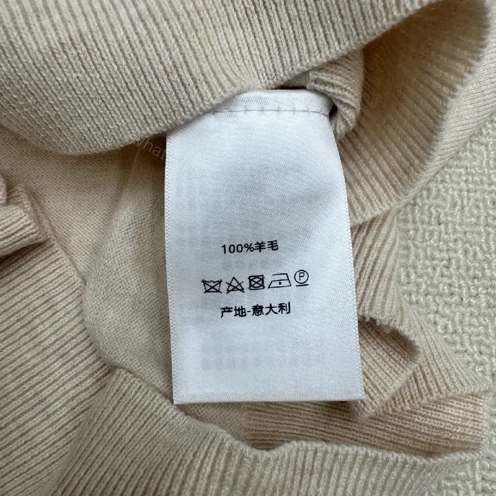 View 11 of Beige Cotton Knit Tee with Gold Crest Emblem