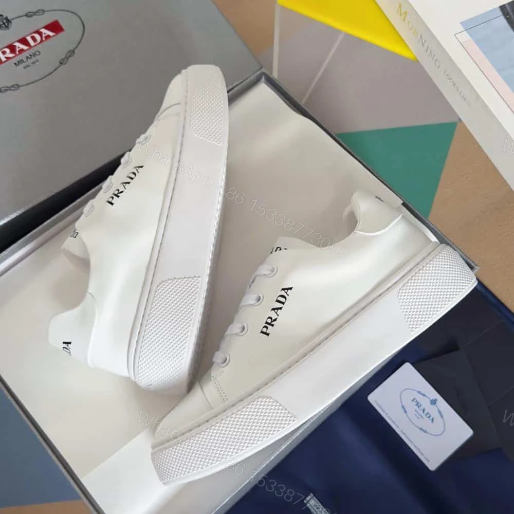 View 2 of PRADA MACRO RE-NYLON AND BRUSHED LEATHER SNEAKERS – PRD064
