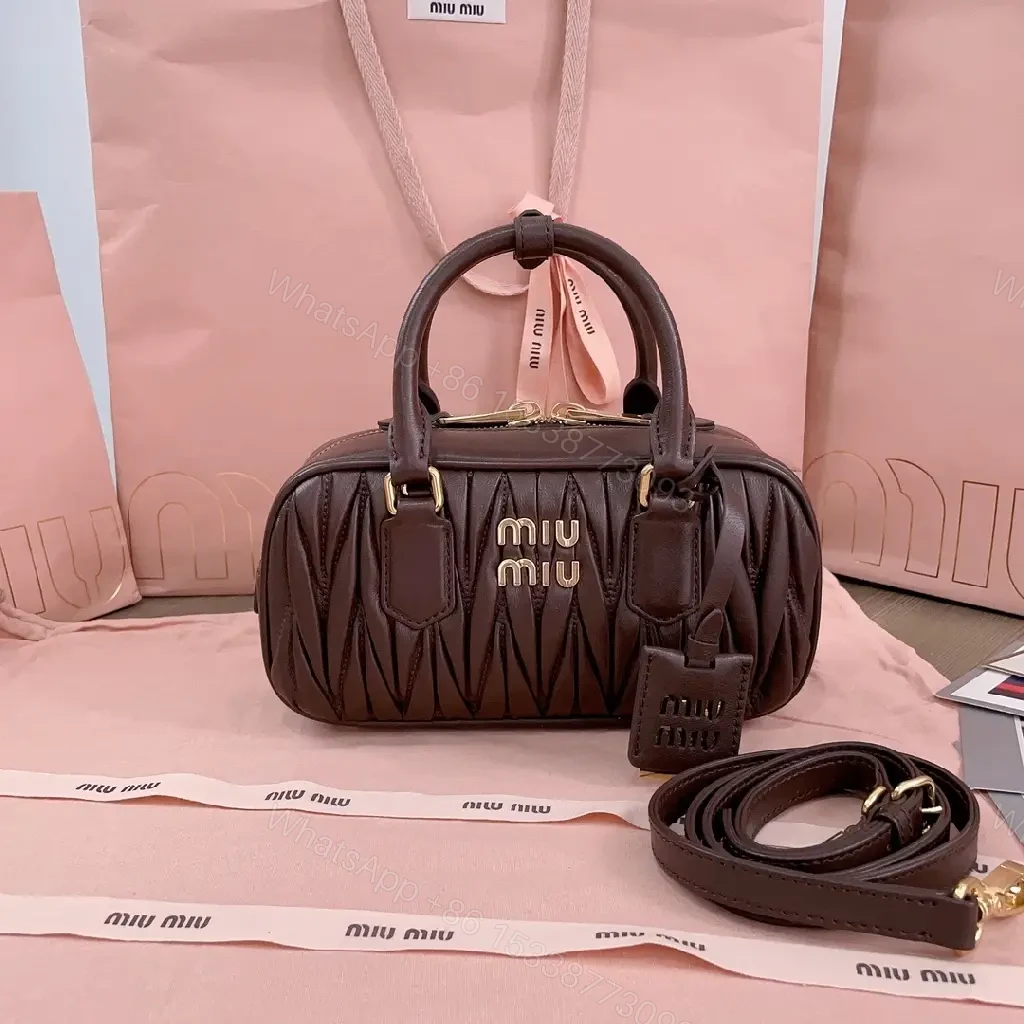 Chic Quilted Leather Satchel with Gold Hardware — view 1