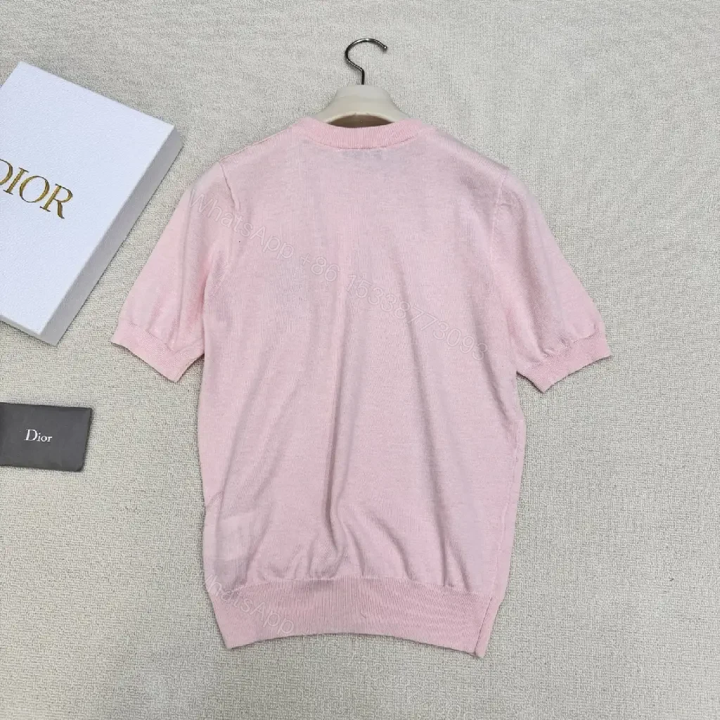 View 8 of Soft Pink Knit Top with Crest – Elegant Everyday Essential