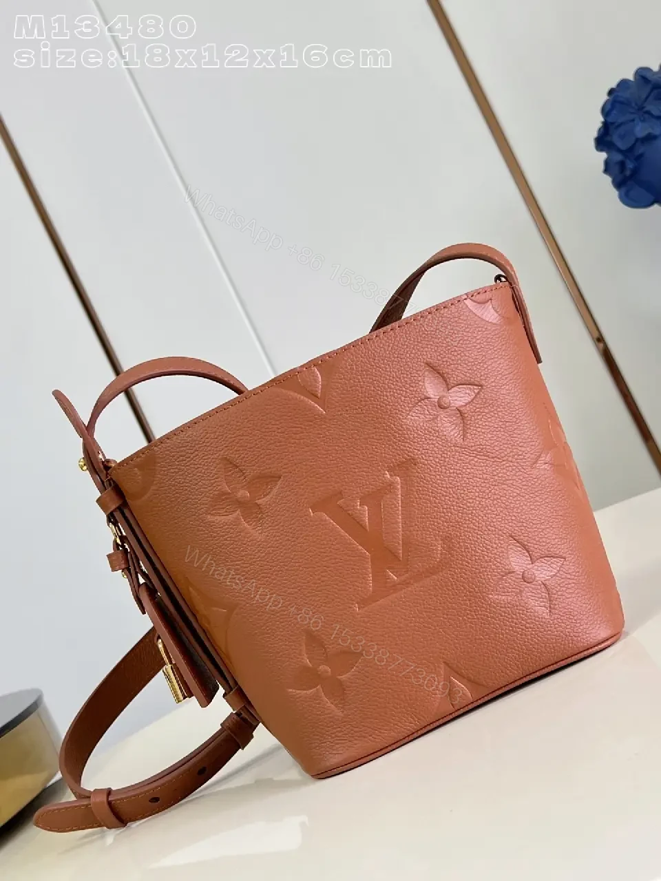Soft-Tone Cropped Bucket Bag with Monogram Embossing Bag — view 1